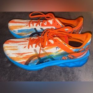 ASICS Novablast running shoes. Size 10. Multicolored blue/orange. Never worn